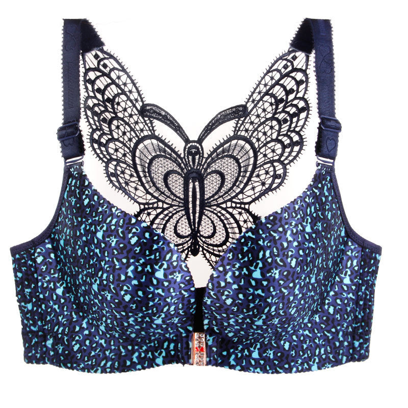 Blue patterned bra with lace butterfly design on a white background