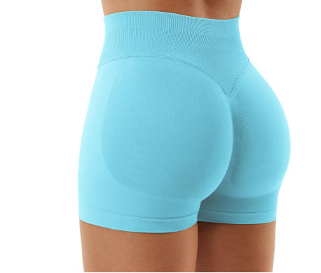 Light blue athletic shorts on a white background