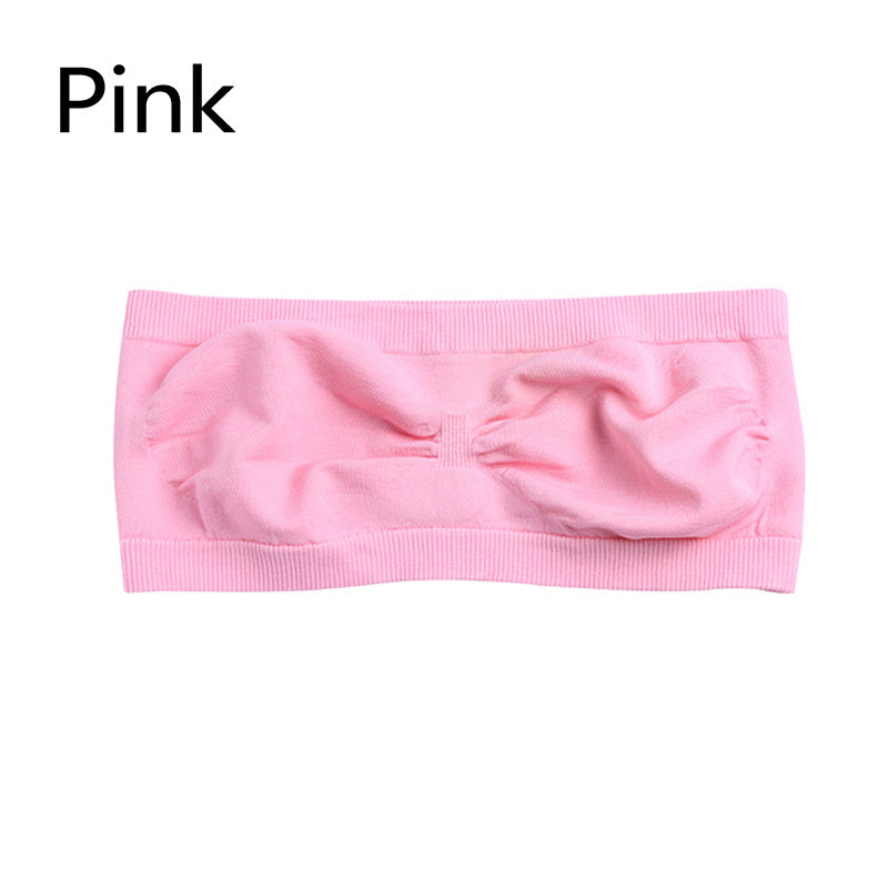 Pink strapless bra on a white background with 'Pink' text above.