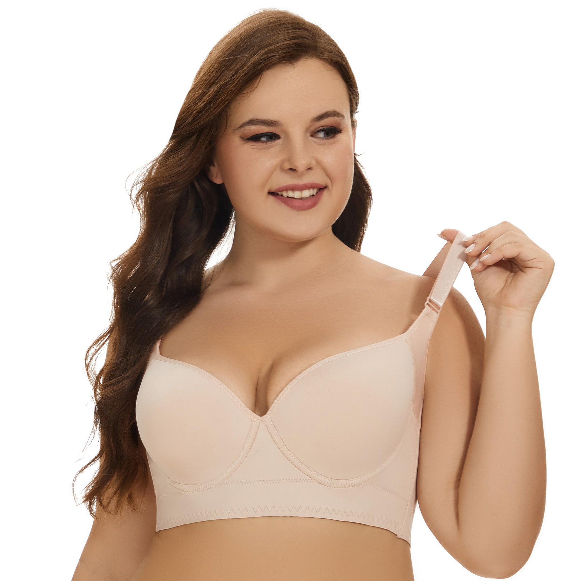Woman wearing a beige bra on a white background
