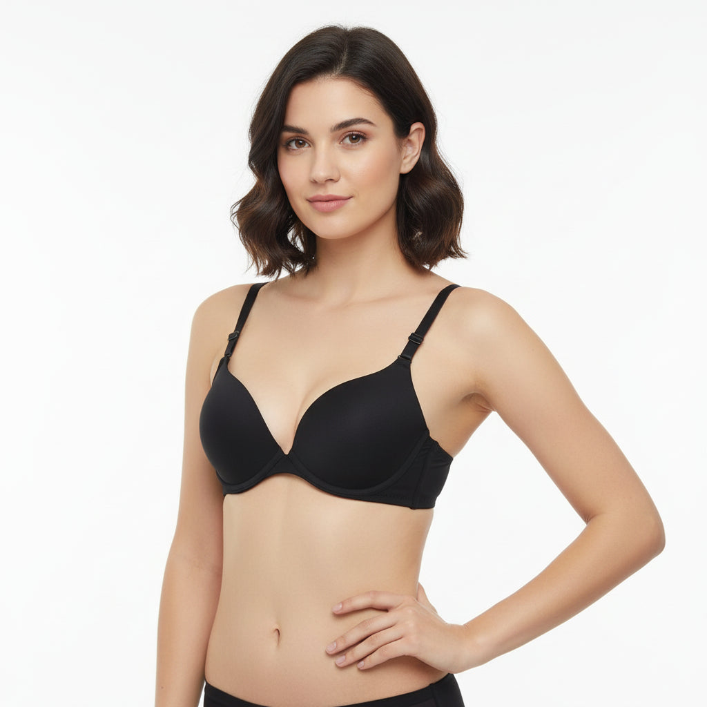 Woman wearing a black bra on a white background