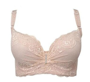 Lace bra in beige color on a white background