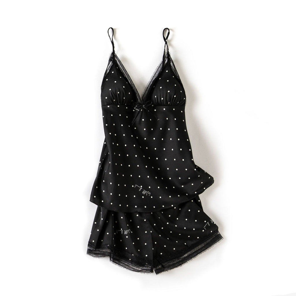 Black polka dot lingerie set on a white background