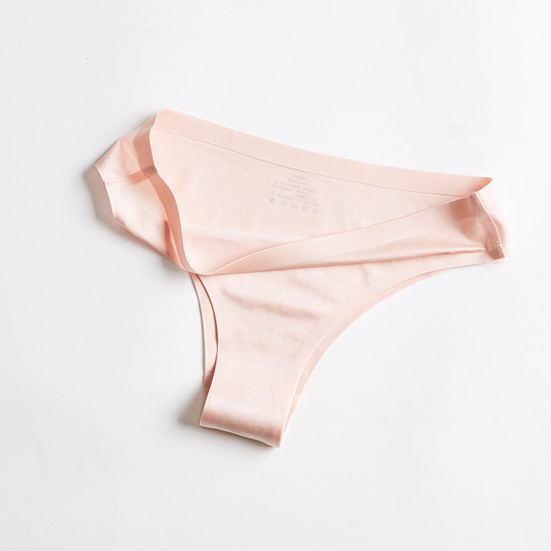 Pink underwear on a light gray background