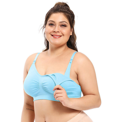 Woman wearing a light blue bra on a white background