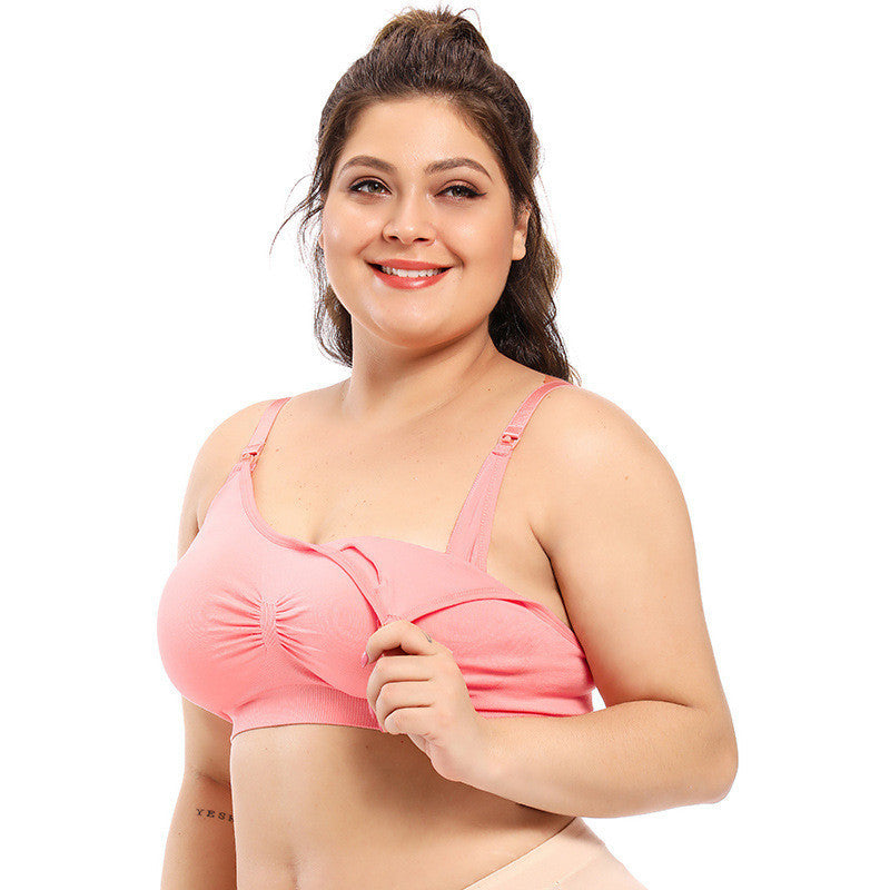 Woman wearing a pink bra on a white background