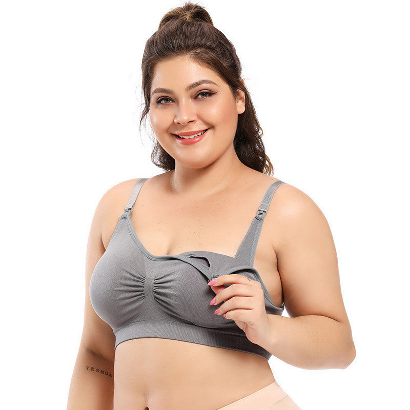 Woman wearing a gray bra on a white background