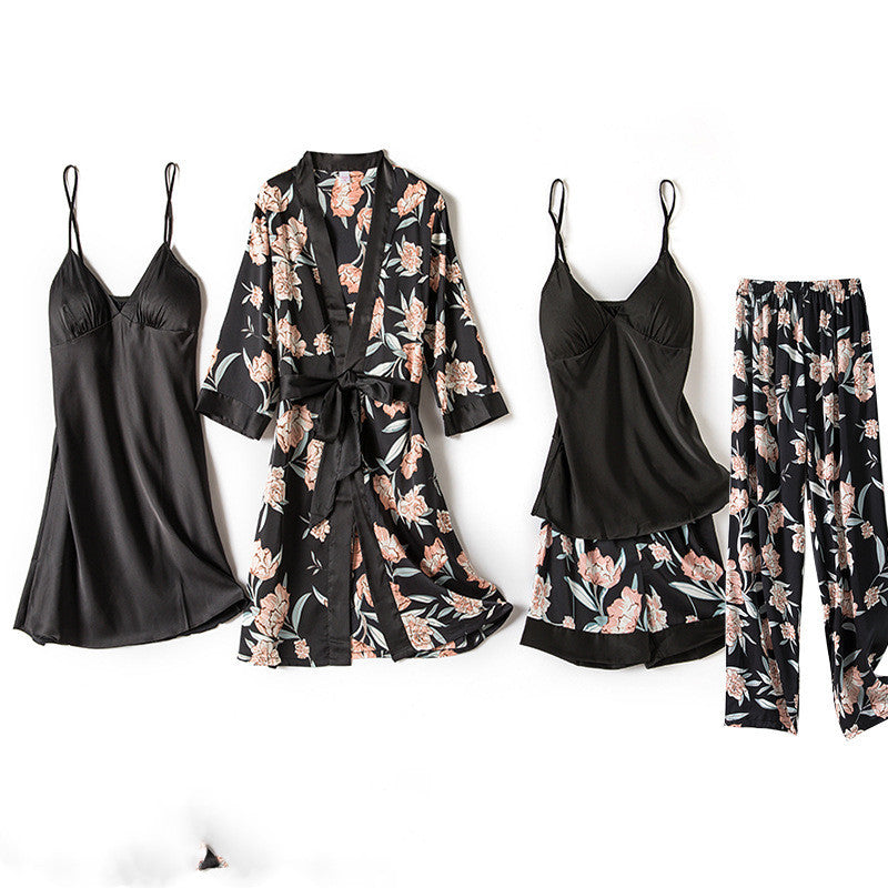 Floral and black satin pajama set on a white background