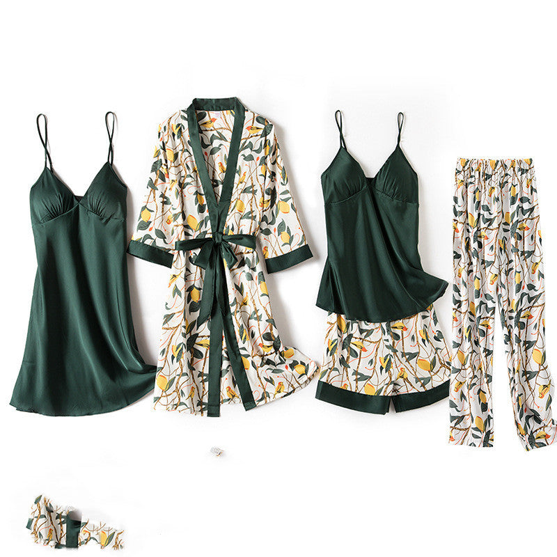 Set of green and patterned pajamas with a robe on a white background