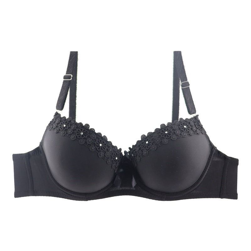 Black bra with lace details on a white background
