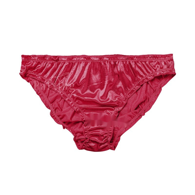 Red shiny underwear on a white background