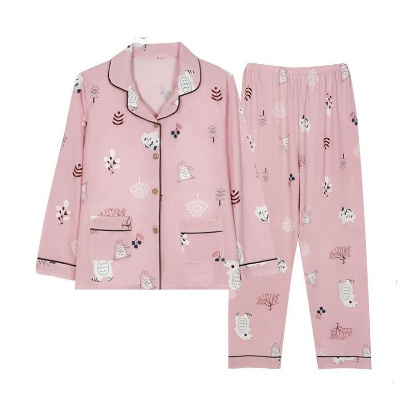 Pink pajama set with animal patterns on a white background