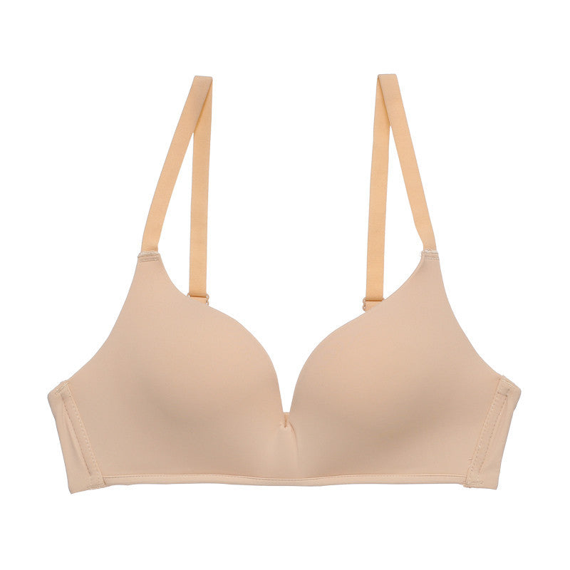 Beige bra on a white background