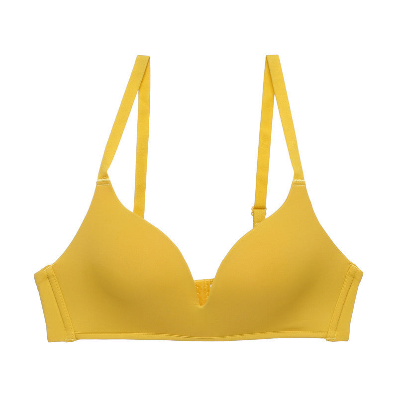 Yellow bra on a white background
