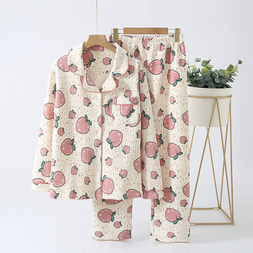 Pajama set with peach pattern on a white background