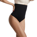 Black shapewear being worn by a model on a white background