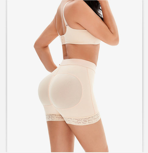 Woman wearing a beige shapewear garment on a white background