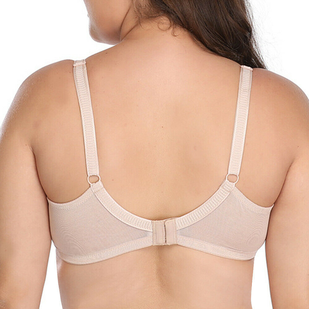 Beige bra worn by a model on a white background