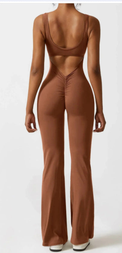 Brown jumpsuit with open back on a white background