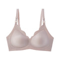 Beige bra on a white background