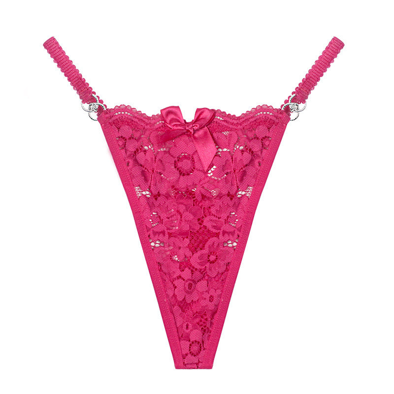 Pink lace thong with floral details on a white background