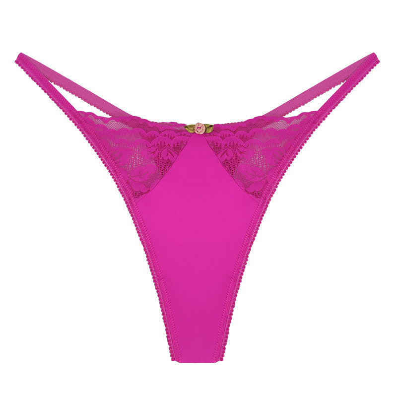 Pink lace thong on a white background