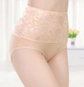 Beige lace underwear on a white background