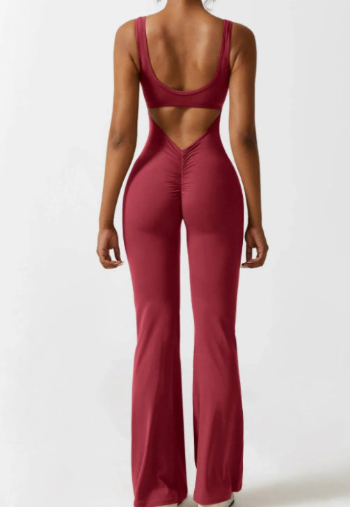Red jumpsuit with open back on a white background