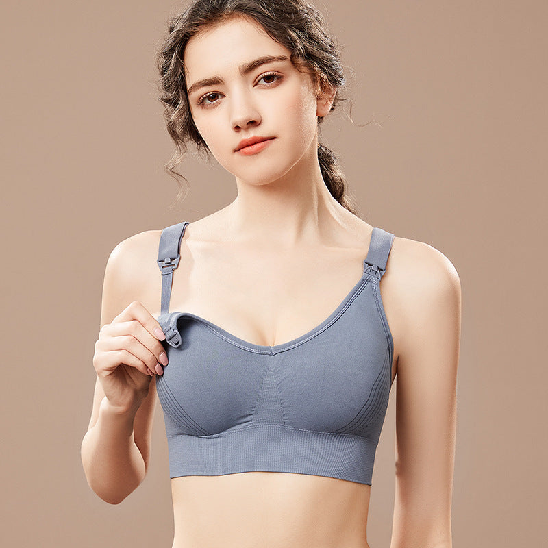 Woman wearing a blue bra against a beige background