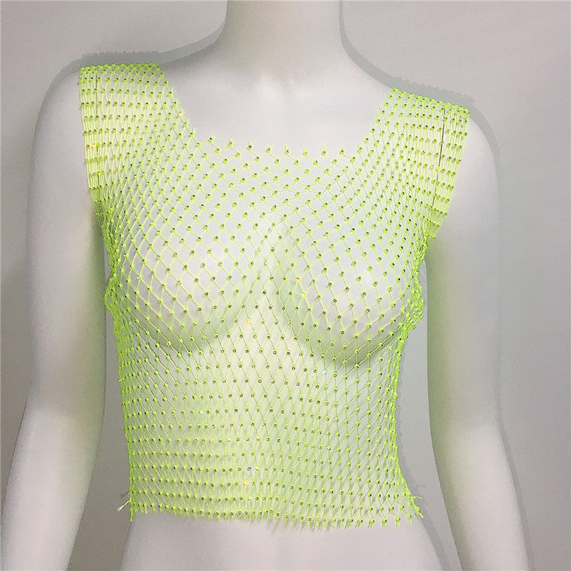 Neon green beaded top on a mannequin against a plain background