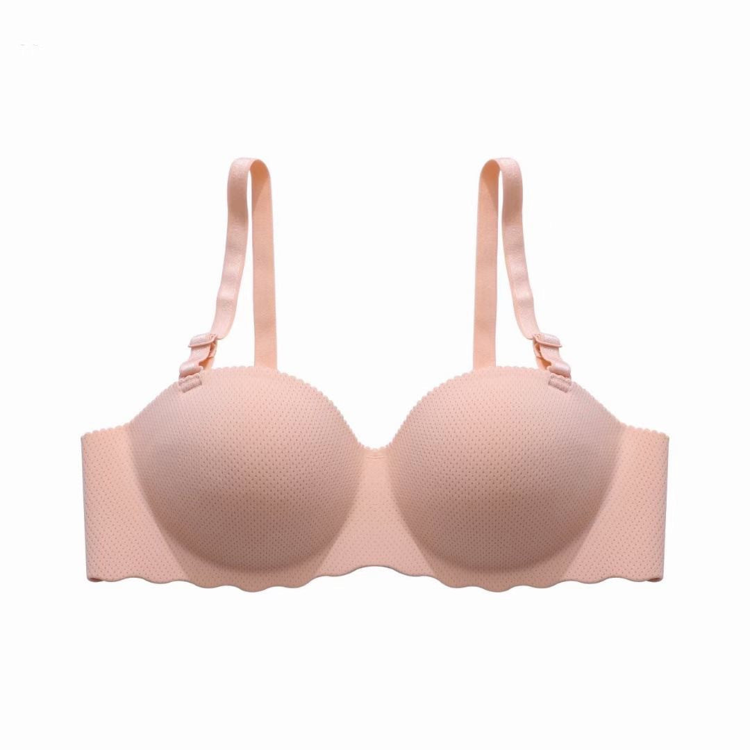 Pink bra on a white background