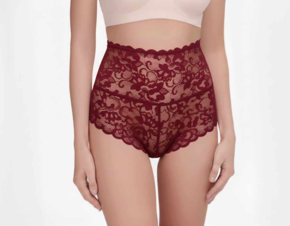 Red lace underwear worn by a model on a white background