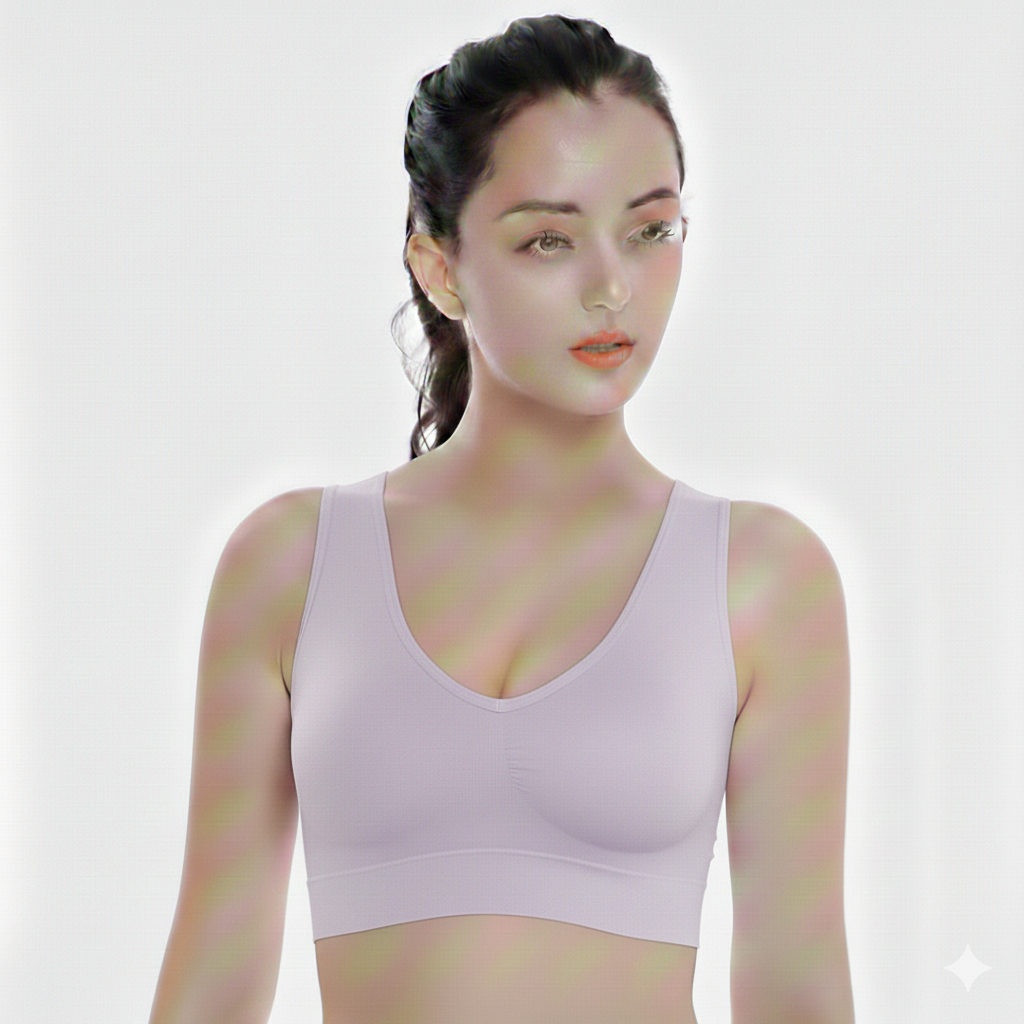 Woman wearing a light purple sports bra against a white background
