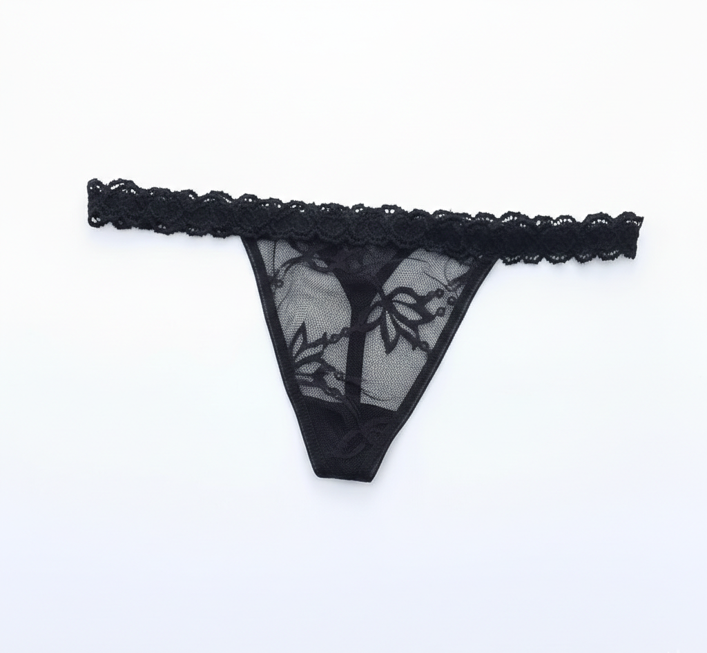 Black lace thong on a white background