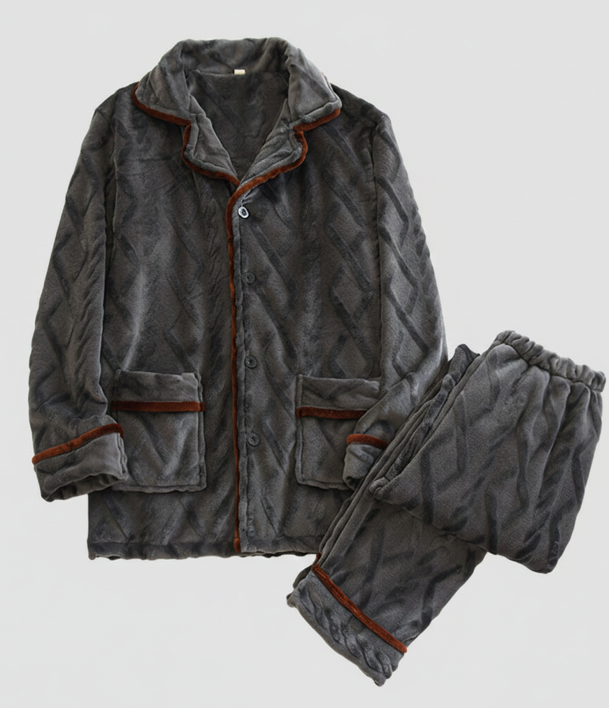 Gray quilted pajama set with brown trim on a light gray background