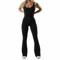 Person wearing a black bodysuit on a white background