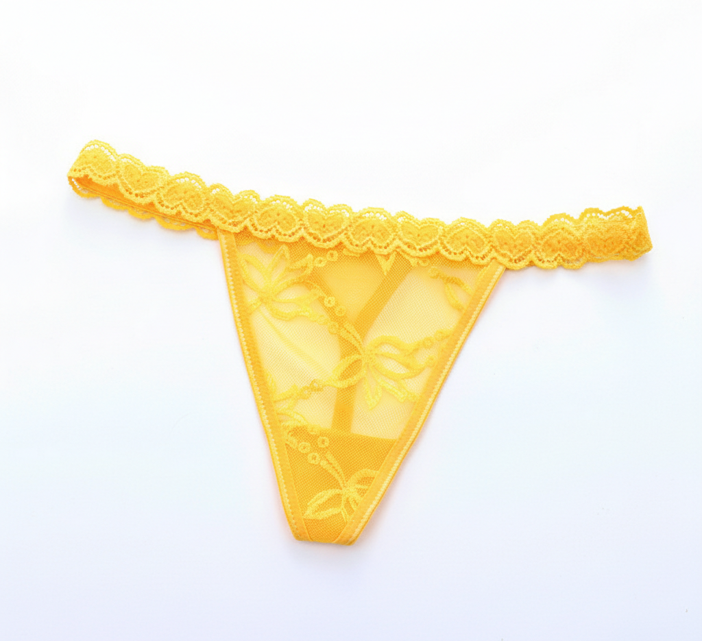 Yellow lace thong on a white background