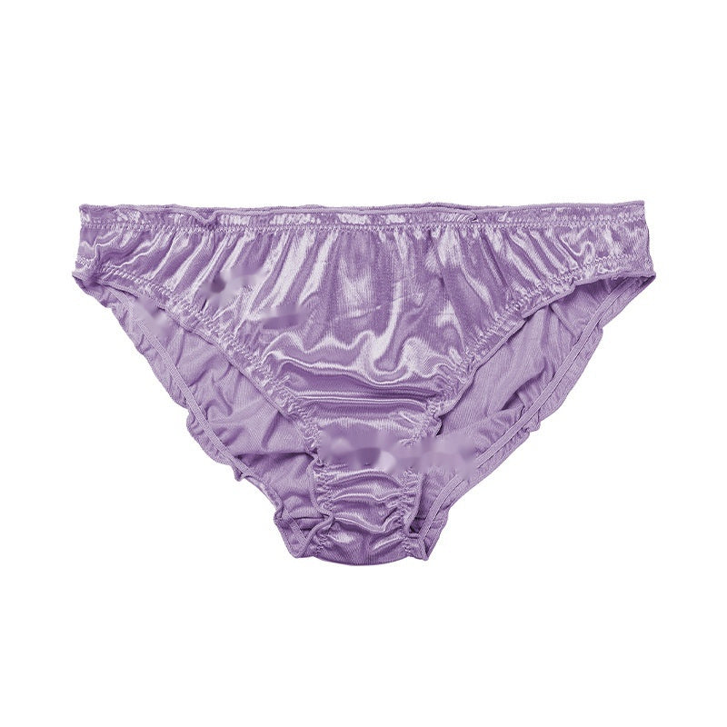 Purple satin underwear with lace trim on a white background