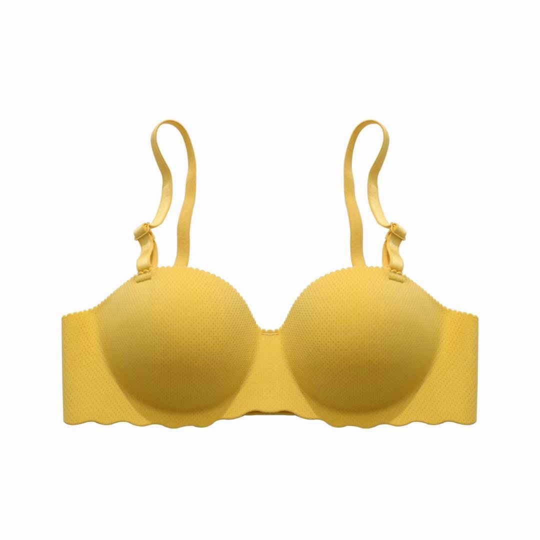 Yellow bra on a white background