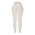 Beige leggings on a white background