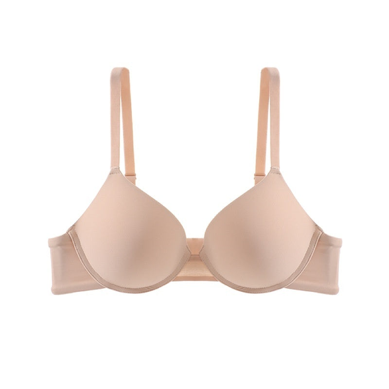 Beige bra on a white background