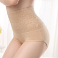 Beige shapewear with lace detailing on a white background