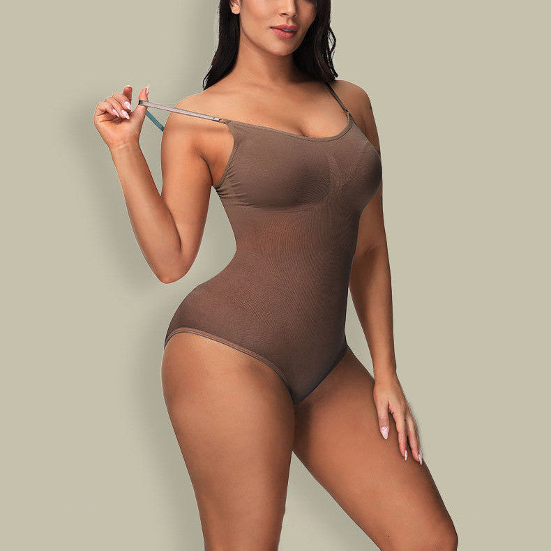 Woman wearing a brown bodysuit against a plain background