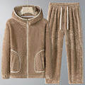 Brown fleece hoodie and pants set on a gray background
