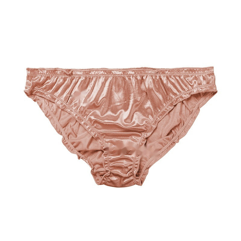 Pink satin underwear on a white background