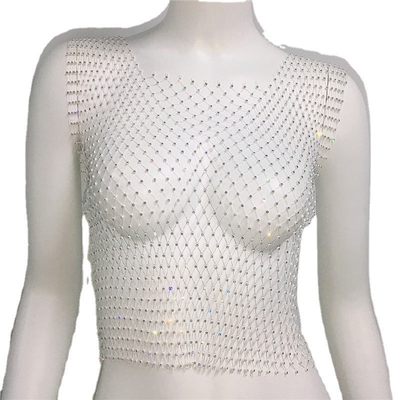Mannequin wearing a white mesh top with bead embellishments on a white background