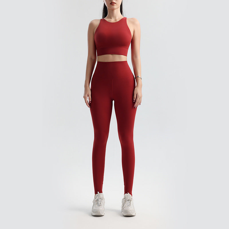 Person wearing a red athletic outfit on a white background