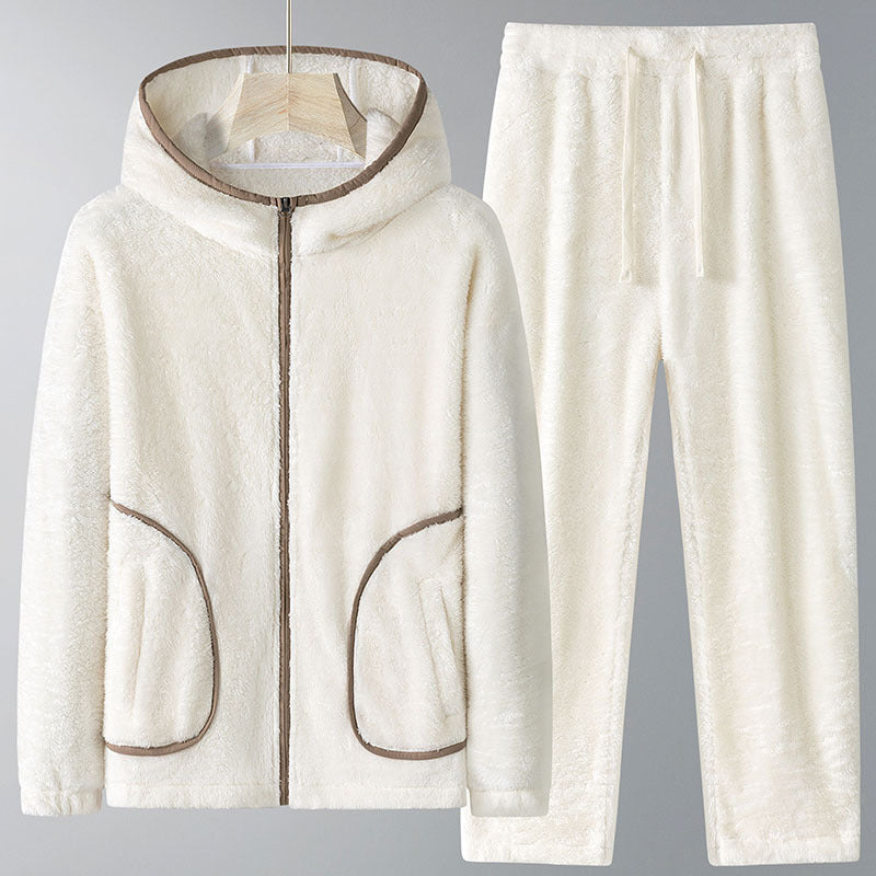 White fleece hoodie and pants set on a gray background