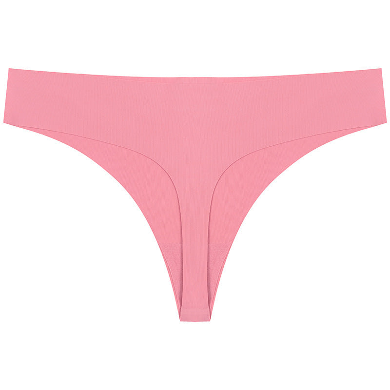 Pink thong on a white background