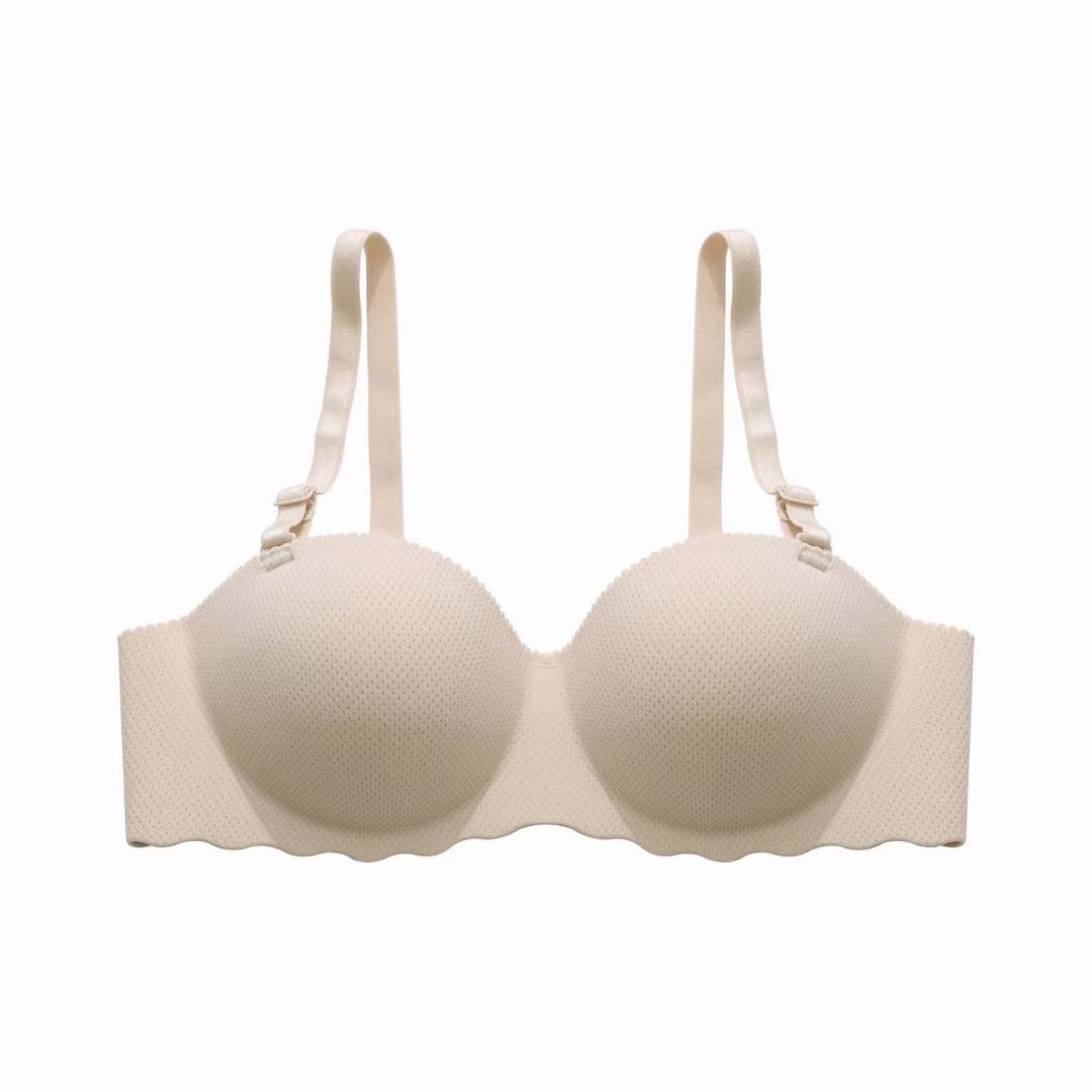 Beige bra on a white background